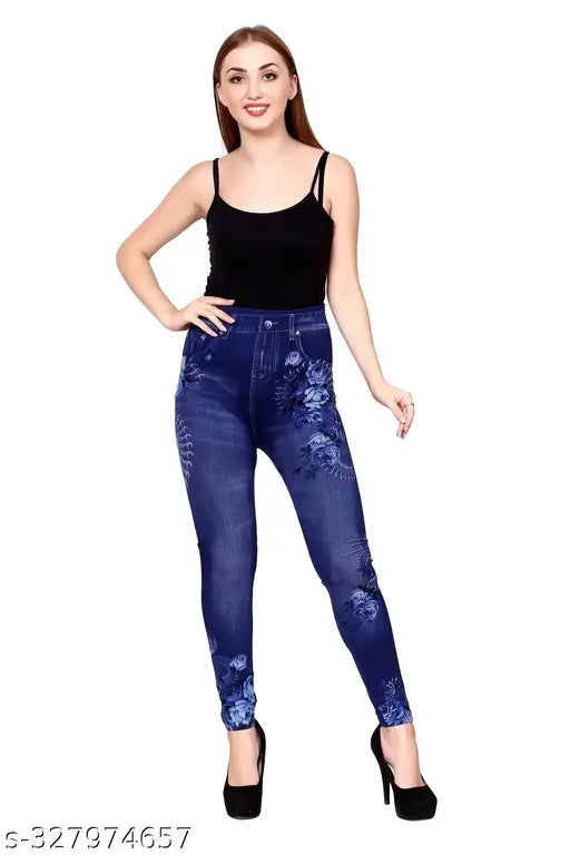 Blue printed denim jegging for women and girls from Vinayfab, featuring a stretchable cotton poly blend fabric and printed design. Model is 5'10" with waist size 30 inches, wearing size M. Available in sizes 28, 30, 32, Free Size, M, L, XL. Made in India