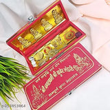 Golden brass Shri Dhan Laxmi Kuber Bhandari Yantra Set with various accessories, including idols of deities Laxmi, Ganesha, Saraswati, Dhan Laxmi pendant, coins, Rudraksha, and Meru Chakra Shri Yantra. Traditional Indian spiritual artifact for wealth and prosperity
