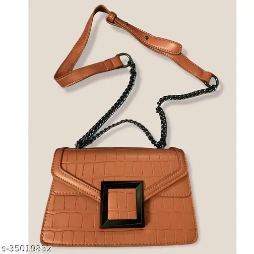 Brown leather crossbody bag with zip closure and silver hardware