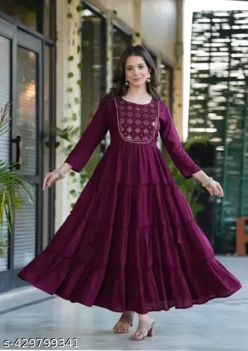 Embroidered rayon wine flared gown with three-quarter sleeves, trending light wine shade, India origin