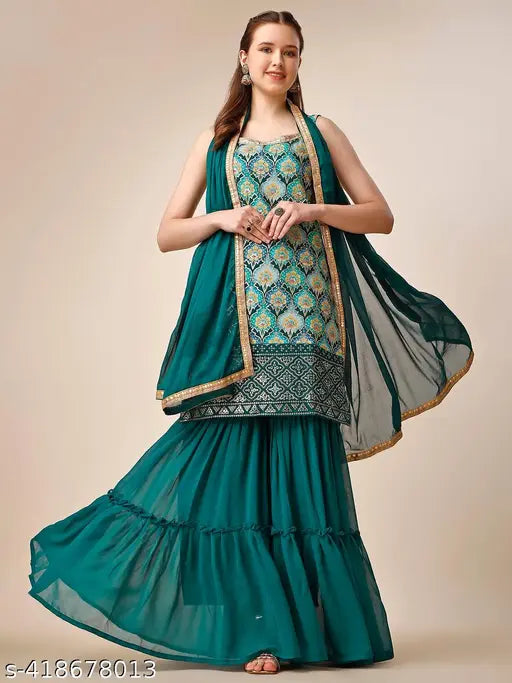 Vividly printed sequined kurta and dupatta in blue, gold and white, featuring ethnic motifs and long sharara skirt