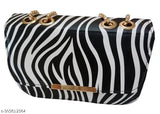 Black and white zebra print fabric, quilted design, flap closure