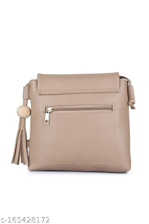 Brown leather sling bag with tassel
