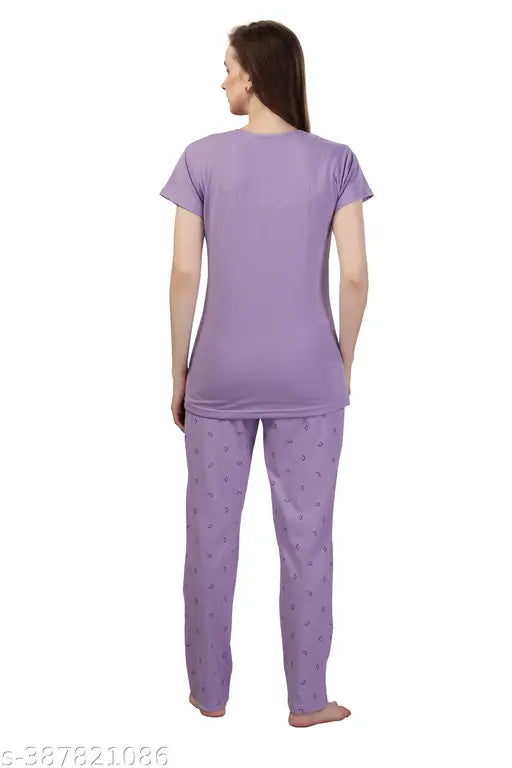 Purple hosiery cotton printed half-sleeve nightsuit top and pyjama set for women, ideal for sleepwear and loungewear. Relaxed fit with elastic waistbands. Available in sizes M, L, XL, XXL. Made in India