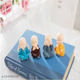 Four-piece Morater figurine set, featuring Buddha monks with hands clasped, in shades of brown and blue