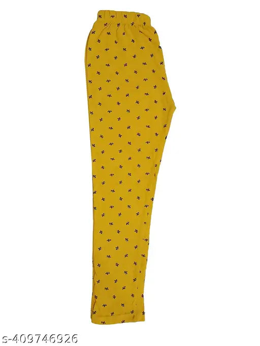 Yellow and black patterned women's casual track pants, with multi-colored print; hosiery cut