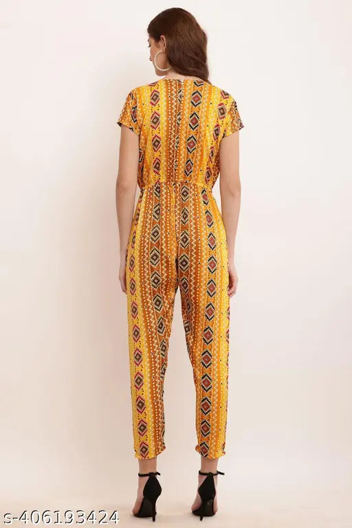Printed rayon jumpsuit for women and girls, featuring short sleeves and colorful print. Available in sizes S, M, and L