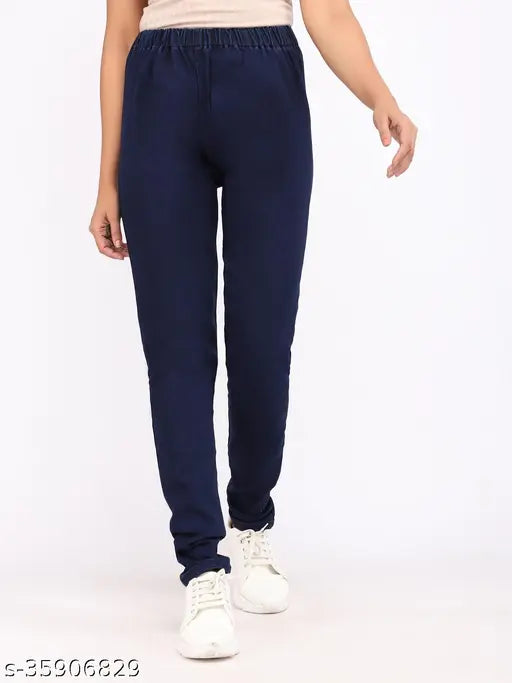 Denim skinny fit stretchable medium waist elastic closer navy blue jeggings for women, solid design on a mannequin