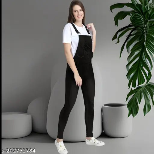 Denim sleeveless women's high waist blue dungaree jeans, adjustable straps, four pockets, belt loops, mock fly, metallic button closures. Choose correct waist size for long-lasting quality. India origin