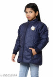 A young girl in a navy blue coat with a zipper on the front