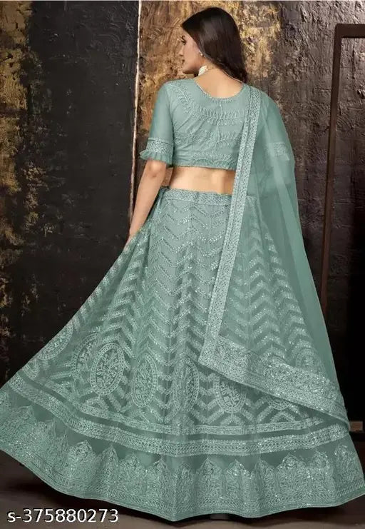 Mint green embroidered lehenga choli set on mannequin, net fabric with intricate details, Indian semi-stitched traditional wear (44in waist, 42in length, 2.25in dupatta)