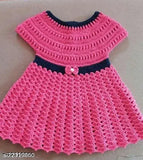 Handmade pink wool baby frock with short sleeves, solid pattern. 0-6 months size from India