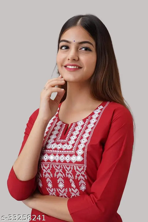Red blouse with embroidered sleeves, short sleeves, and button closure