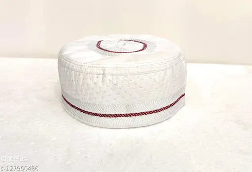 White cotton traditional Islamic cap with intricate embroidery, suitable for men's salat prayer. Comfortable, authentic, washable design with cross-line texture. Original condition, no stains, scratches, tears or holes. Quality product, best rate on Gillkart. Please measure size before ordering. Made in India