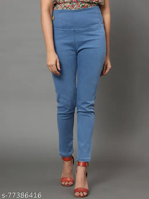 Dark blue denim skinny fit jeggings with high waist and elastic closer, women's solid style