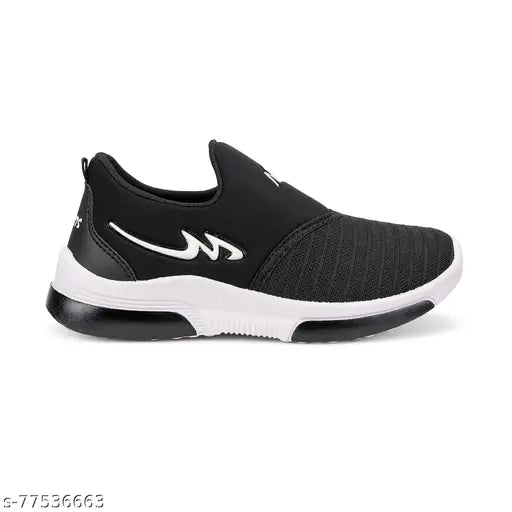 Black trendy kids sports sneakers with white trim, white sole, and a black lace-up closure