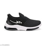 Black trendy kids sports sneakers with white trim, white sole, and a black lace-up closure