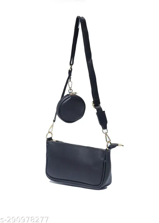 A trendy, sleek, black leather shoulder bag with a smaller pouch