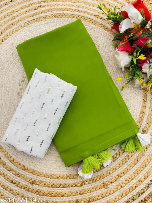 Green georgette saree with tassels