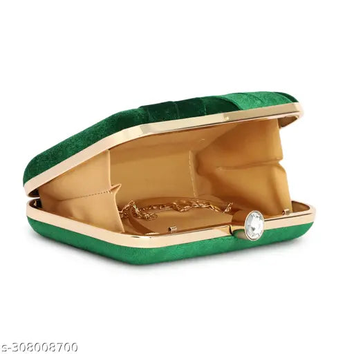 A luxurious gold velvet clutch purse with a necklace on display, for women's evening party or bridal wear