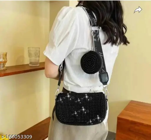 Black and white stylish women sling bag with multiple pockets and a crossbody strap