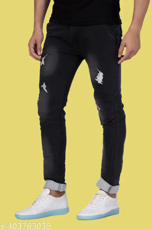 Men's black denim ripped jeans for unapologetic style, size 30/40 in, made by Vinayak Trading Co. in India