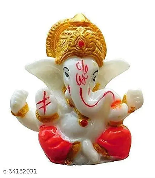 Yellow resin Ganesha idol, ideal for car dashboards, home decor, or gifts. Pack includes 1 statue (2x1x6.5 cm). Care instructions: wipe clean and dry. Made in India