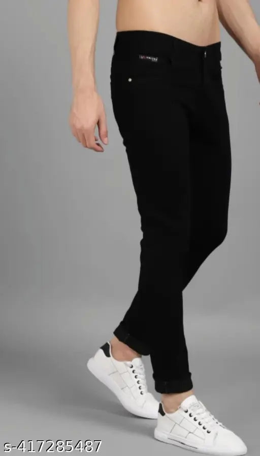 Black stretchy men's regular mid rise jeans, cuffed bottoms