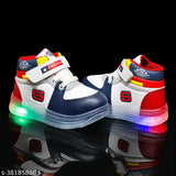 The image shows a pair of N2Pro LED light stylish shoes. These are designed for kids and boys, with cool red and blue neon accents. The shoes have a modern design with white soles and laces, and they feature a unique and innovative LED light on the bottom