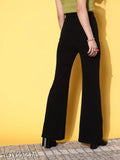 Black high-waisted jumpsuit with wide-leg trousers and deep v-neck top