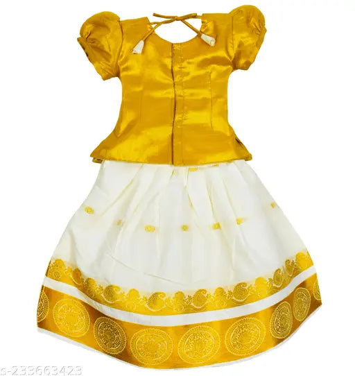 Traditional Grand Kerala Embroidered cotton lehenga-choli for kids, featuring ethnic motif and semi-silk jacquard top, zari embroidery bottom with heavy stone work