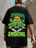 Men's black oversized round neck half sleeve graphic printed T-shirt with skull design, cotton blend fabric. Perfect for casual wear or sport activities
