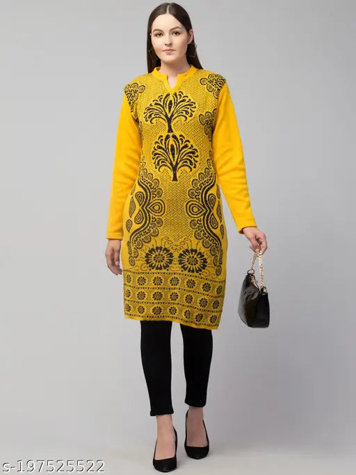 A woman in a mustard yellow paisley patterned wool kameez with a zipper front