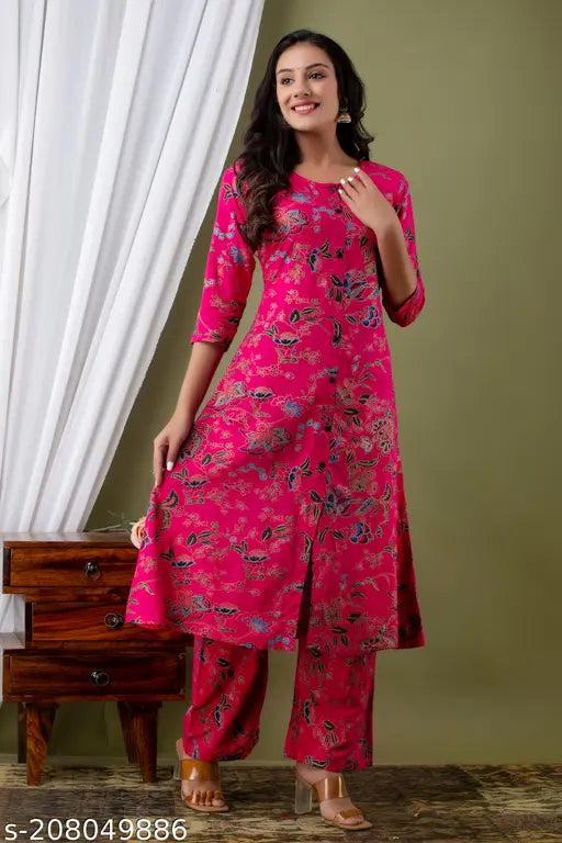 Rayon Demirner Women's Printed Kurta Palazzo Ethnic Set with three-quarter sleeves, self-designed net pattern on display. Sizes: S (Bust 36", Kurta 44", Bottom 38"), M (Bust 38", Kurta 44", Bottom 38"), L (Bust 40", Kurta 44", Bottom 38"), XL (Bust 42", Kurta 44", Bottom 38"), XXL (Bust 44", Kurta 44", Bottom 38"), XXXL (Bust 46", Kurta 44", Bottom 38"), 4XL (Bust 48", Kurta 44", Bottom 38"), Made in India