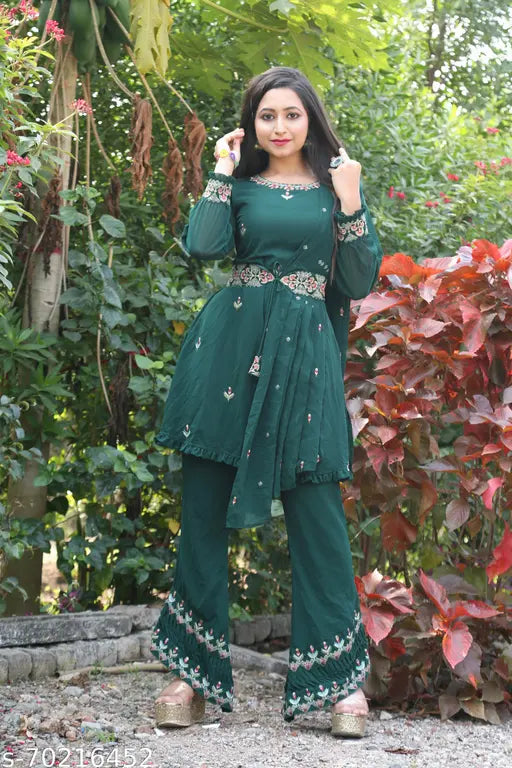 Green faux Georgette full stitched Kurta Palazzo set with embroidered top and dupatta, women's Indian clothing on display