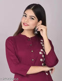 Stylish women's kurta sharara set in dark maroon with embroidered details and a round neckline