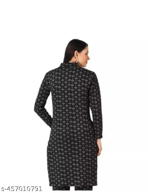 Black woolen long sleeve dress with fitted waist and button down front