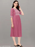 Pink embroidered women's kurta with short sleeves