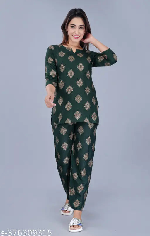Women's printed rayon nightsuit top and pyjama bottom set in three-quarter sleeves, soft and comfortable for relaxation at home. Indian-made printed nightwear with a fashionable touch