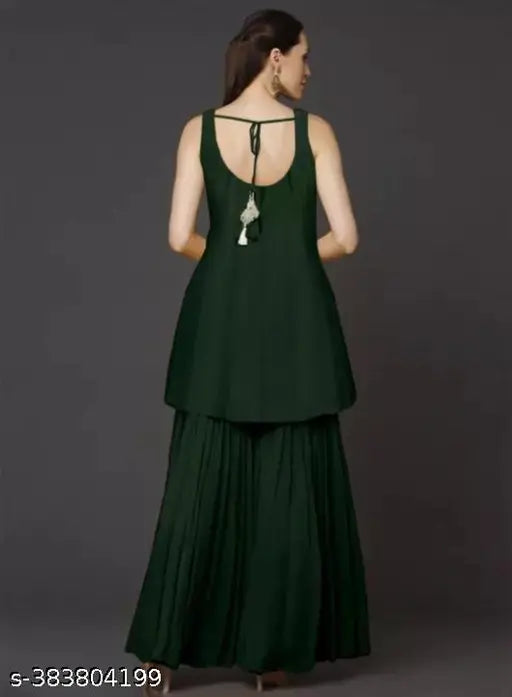 Deep teal embroidered kurta with long skirt and matching dupatta