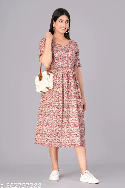 Women's cotton printed fit & flare kurta, three-quarter sleeves, vibrant Indian print on pure cotton dress