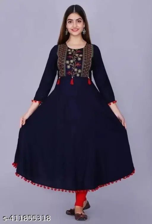 A blue rayon kameez with long sleeves, traditional embroidery, and a straight neckline