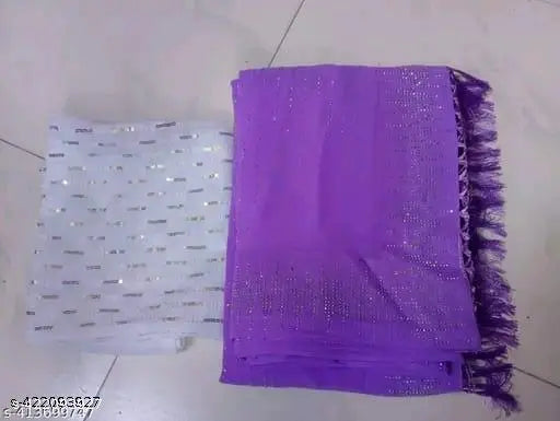 Purple, sequined sari on display
