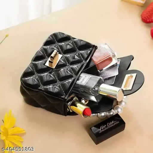 Trendy small clutch crossbody handbag with chain strap, black and pink color scheme