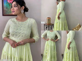 Green cotton embroidered flared Anarkali gown with mirror work and tassels, three-quarter sleeve length, India origin