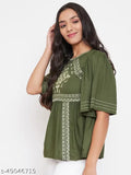 WineRed green embroidered rayon A-line top on hanger, ideal for office and casual wear. Soft against skin, perfect for a day or night out with flared bottom and matching accessories." (103 characters)