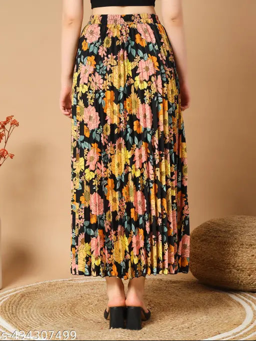Black floral pleated maxi skirt with pockets, perfect for any occasion. High-quality crepe fabric, long design, fits sizes 26-38