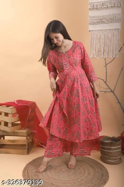 Pink gold rayon kurta and cotton pants with printed net pattern, three-quarter sleeves