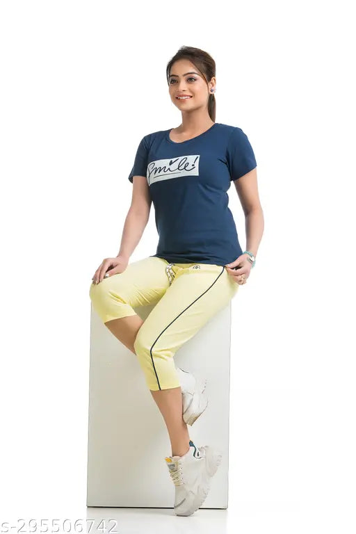 Women's & Girls Cotton Blended Top & Capri Set, soft stretchable and breathable fabric for everyday wear, solid with slim fit and mid-rise. Color may vary due to camera settings. Perfect for cycling, gym, jogging, running, yoga, stretching, work-out, badminton, golf, fitness, daily wear, and special occasions. Night suit set proudly made in India. Essential item for every wardrobe