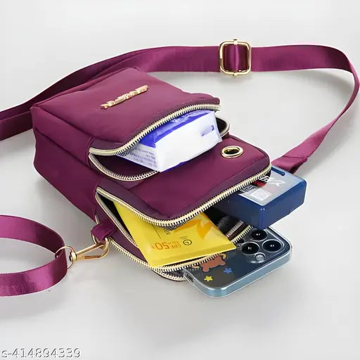 Purple zip-around crossbody bag for women, holding wallet, keys, and cell phone. Imported Korean fashionable travel accessory with waterproof feature